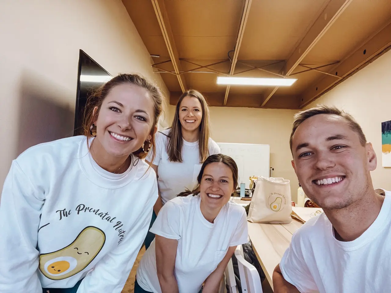 The Prenatal Nutritionist team smiling together in the office